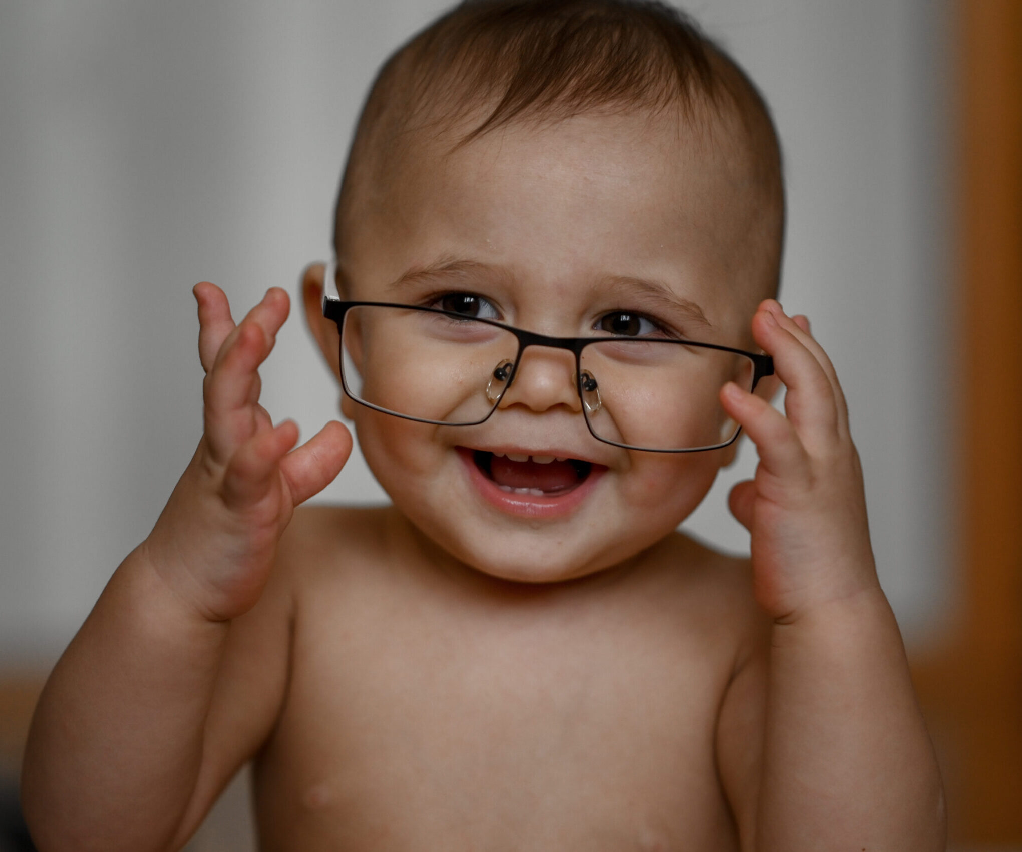 portrait-of-a-baby-with-glasses-the-child-tries-o-2022-03-01-21-18-32-utc